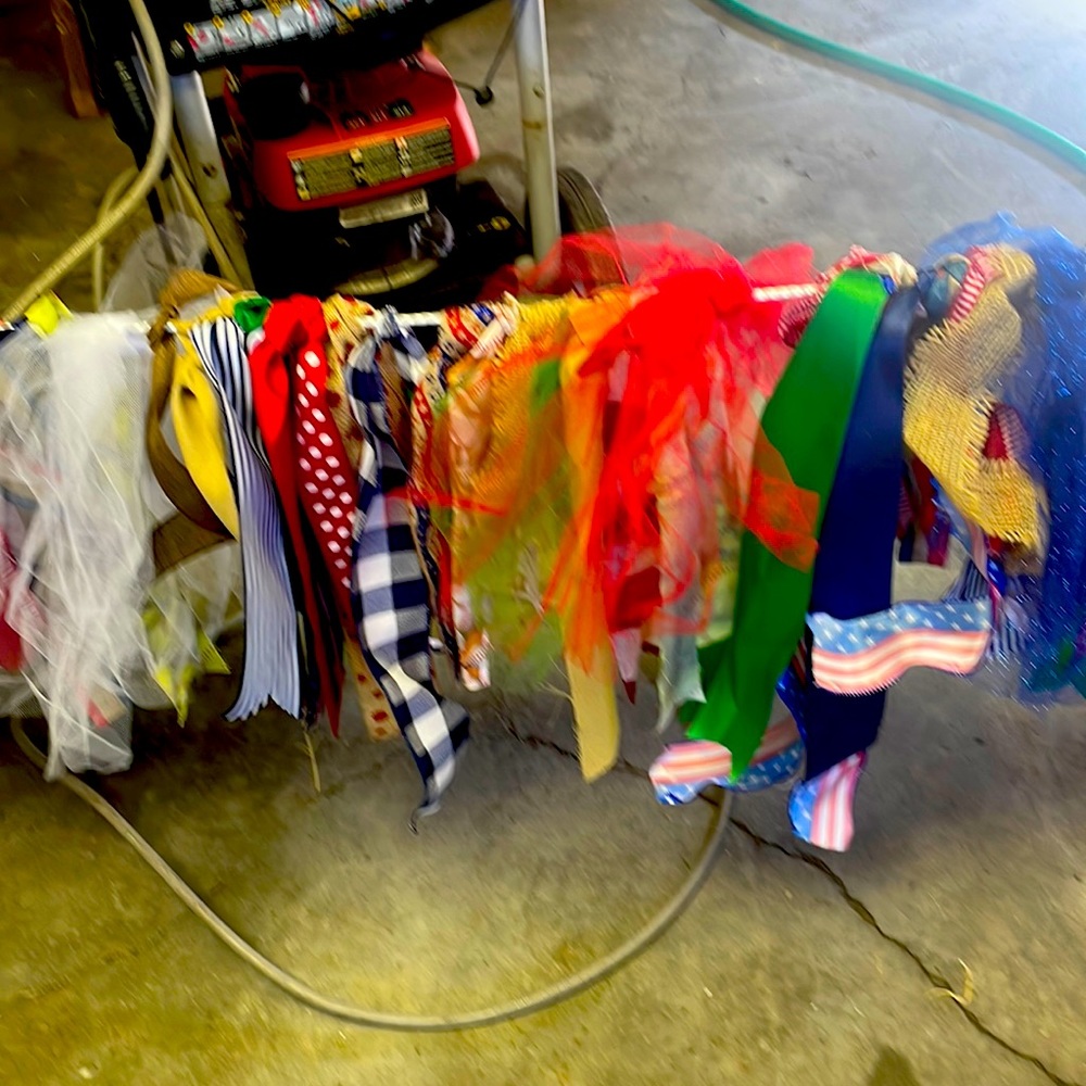 Approx 30 feet of handmade ribbon garland in a patriotic baseball theme.